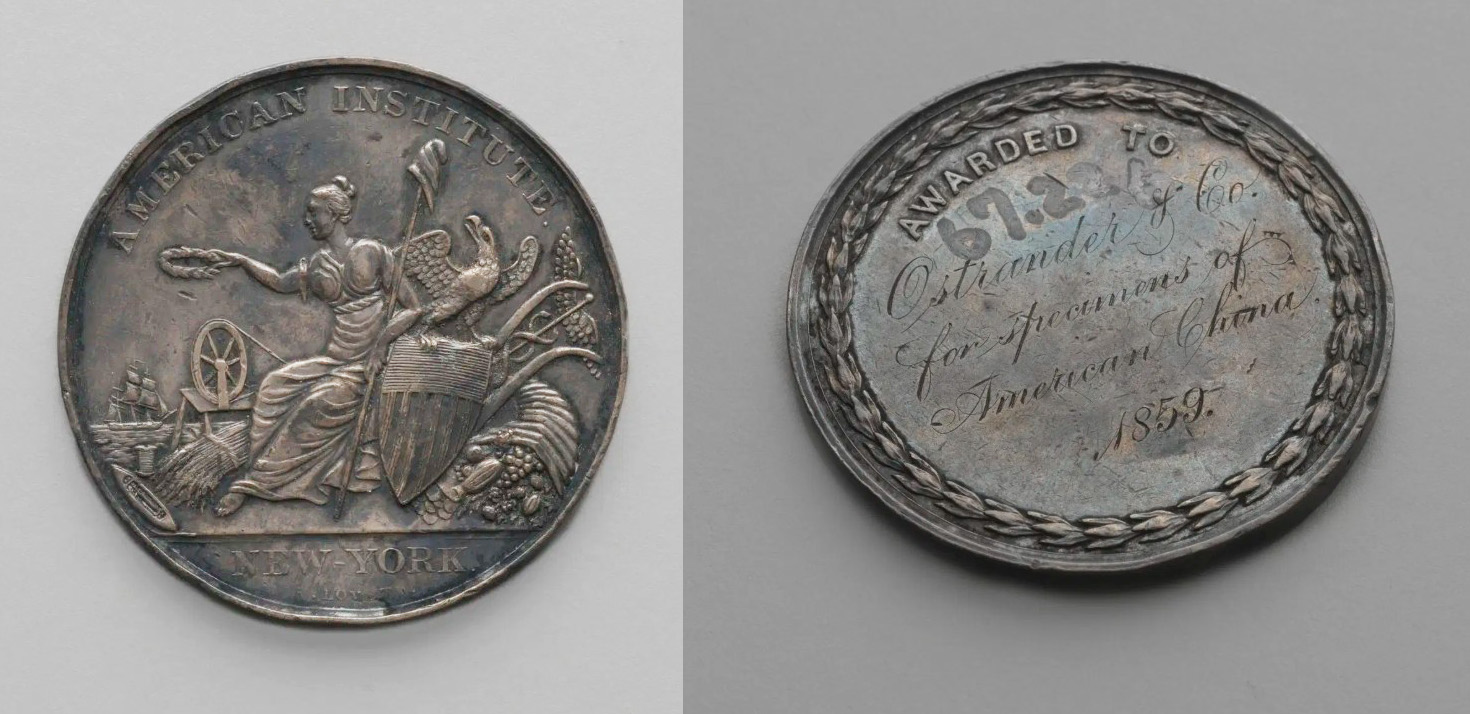Two sides of a silver medal award for excellence in ceramics
