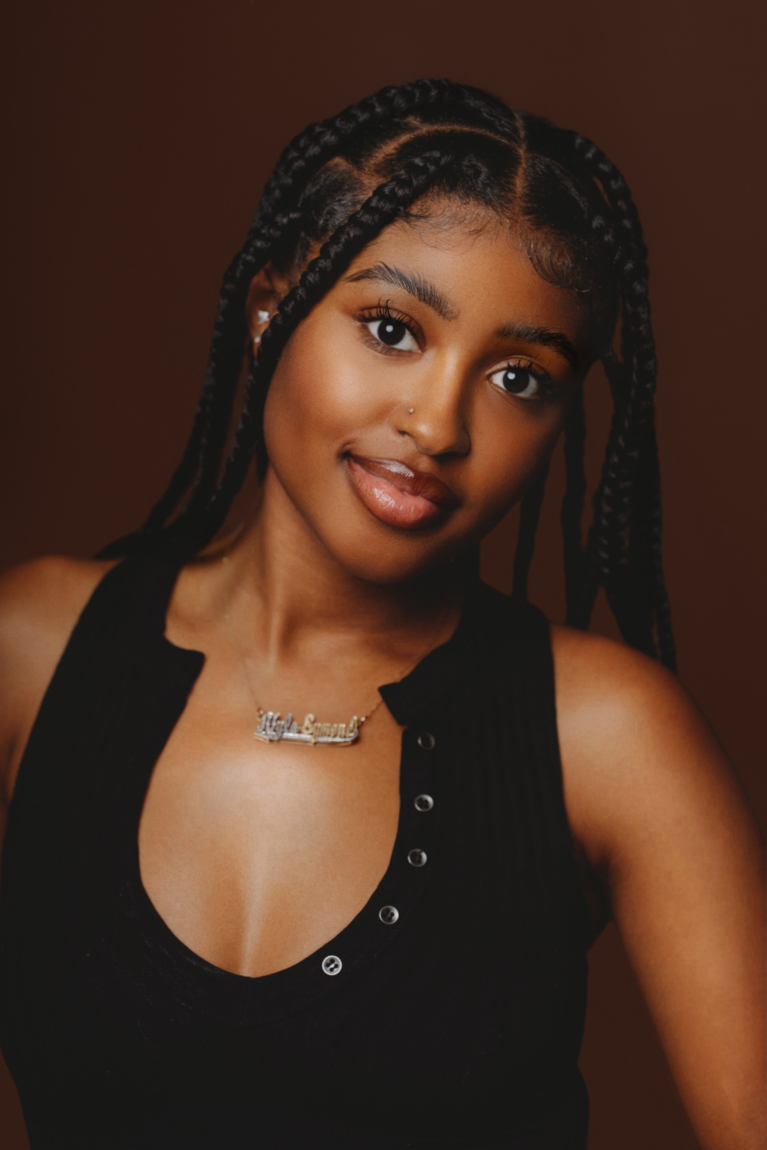 Headshot of Nyla Symone