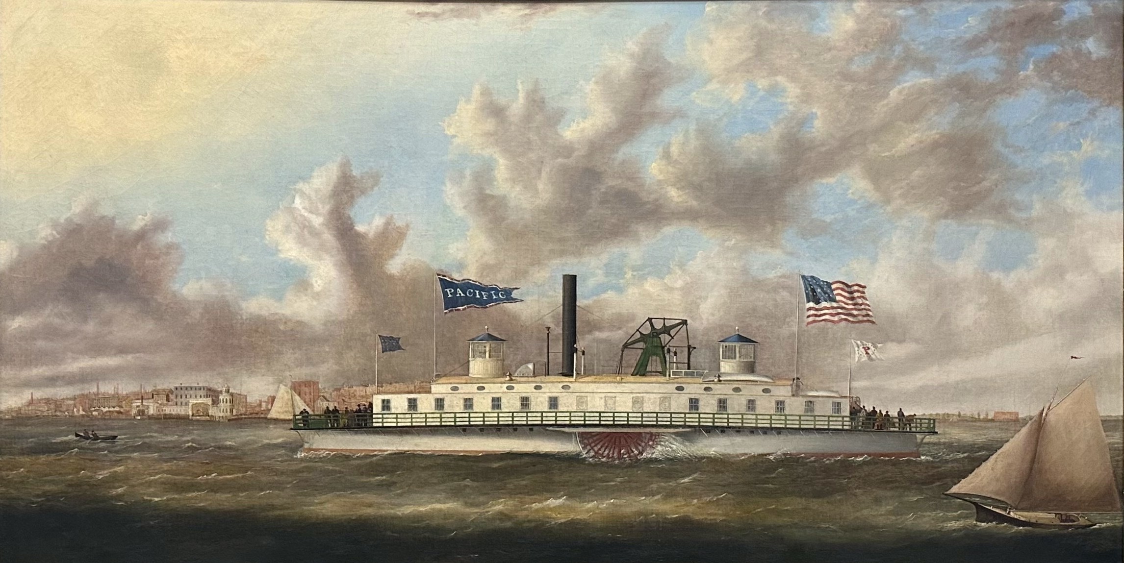 Oil painting of a white double-ended steam ferry in the East River with a sailboat in the foreground right and brick warehouses on the waterfront in the background.