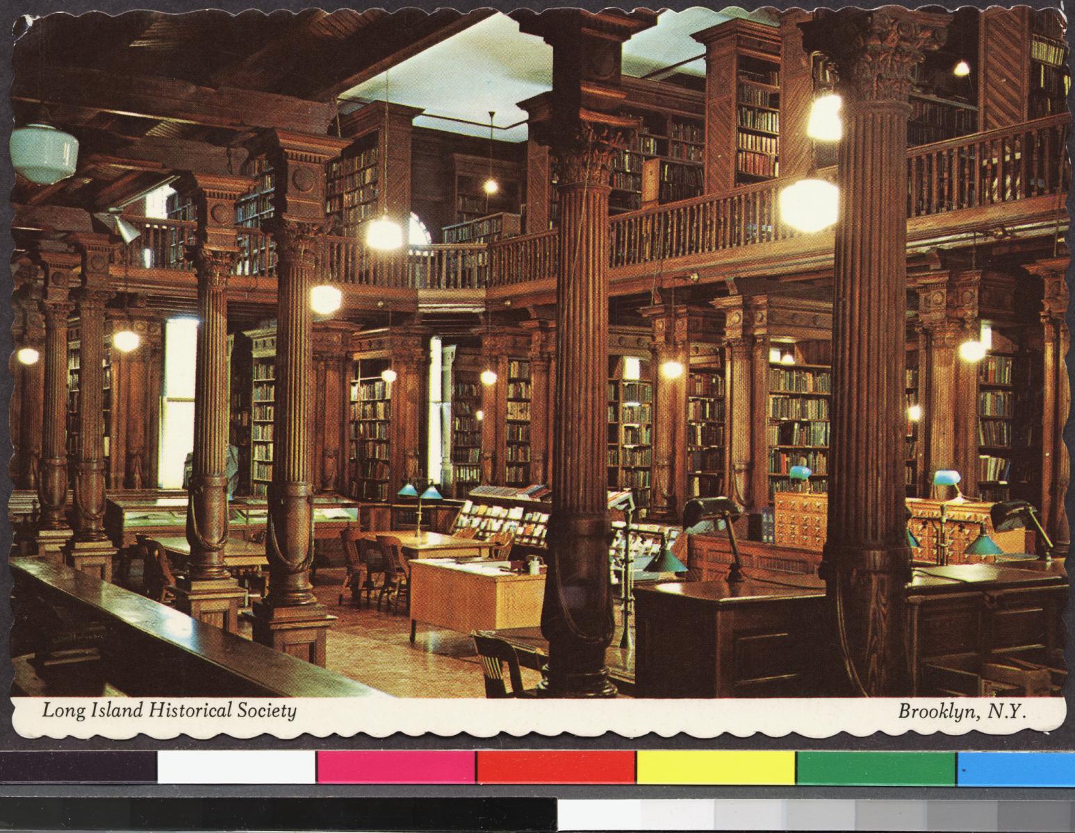 Color photographic postcard of the interior of the Othmer Library at the Center for Brooklyn History, likely taken in the 1950s.