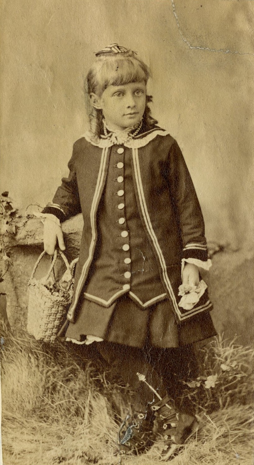 Black and white full length portrait image of young girl