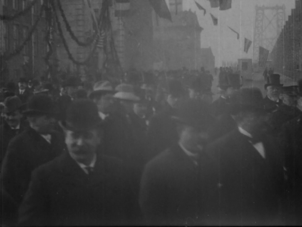 A still from a 1903 film clip of the 1903 opening of the williamsburg bridge