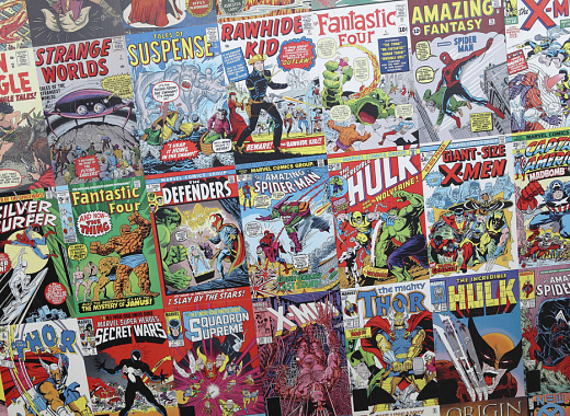 A collection of classic comic books placed side by side