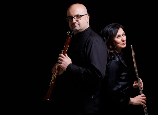 two musicians in black