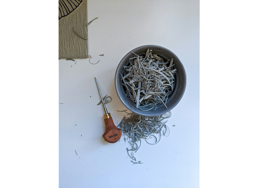 Pfeil linocut printing tool and lino offcuts Photo by Stephanie Mulrooney on Unsplash