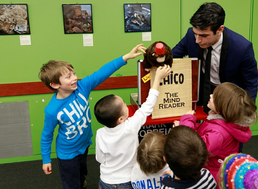 Magician performing with children