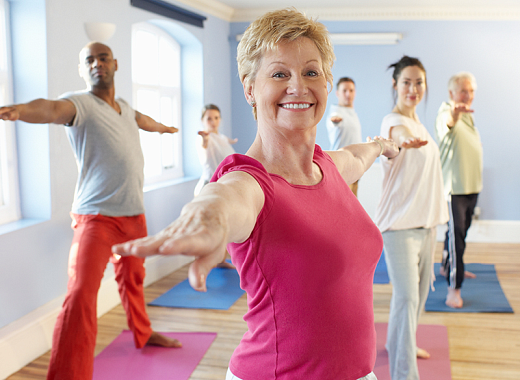 happy people doing yoga